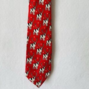 The Big Dogs 100% silk tie pattern of dogs wearing antlers on a red background